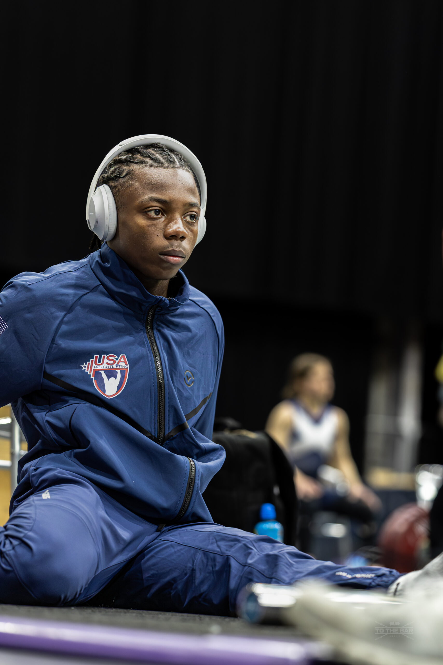 Athlete wearing headphones before competition